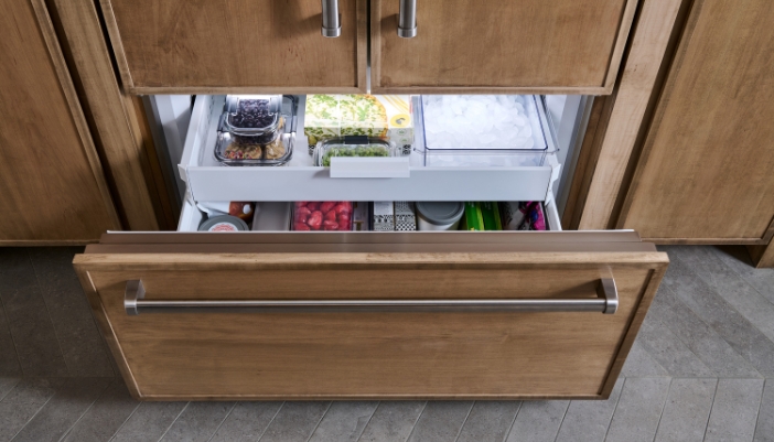 Ethylene-producing fruit stored separately from ethylene-sensitive vegetables in a Sub-Zero refrigerator