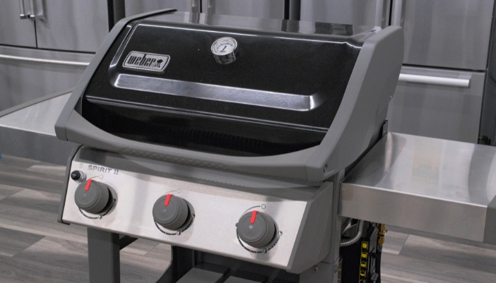 A small closed weber grill featured.