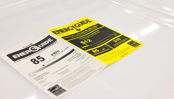 An energy guide for appliances rests open on a countertop.