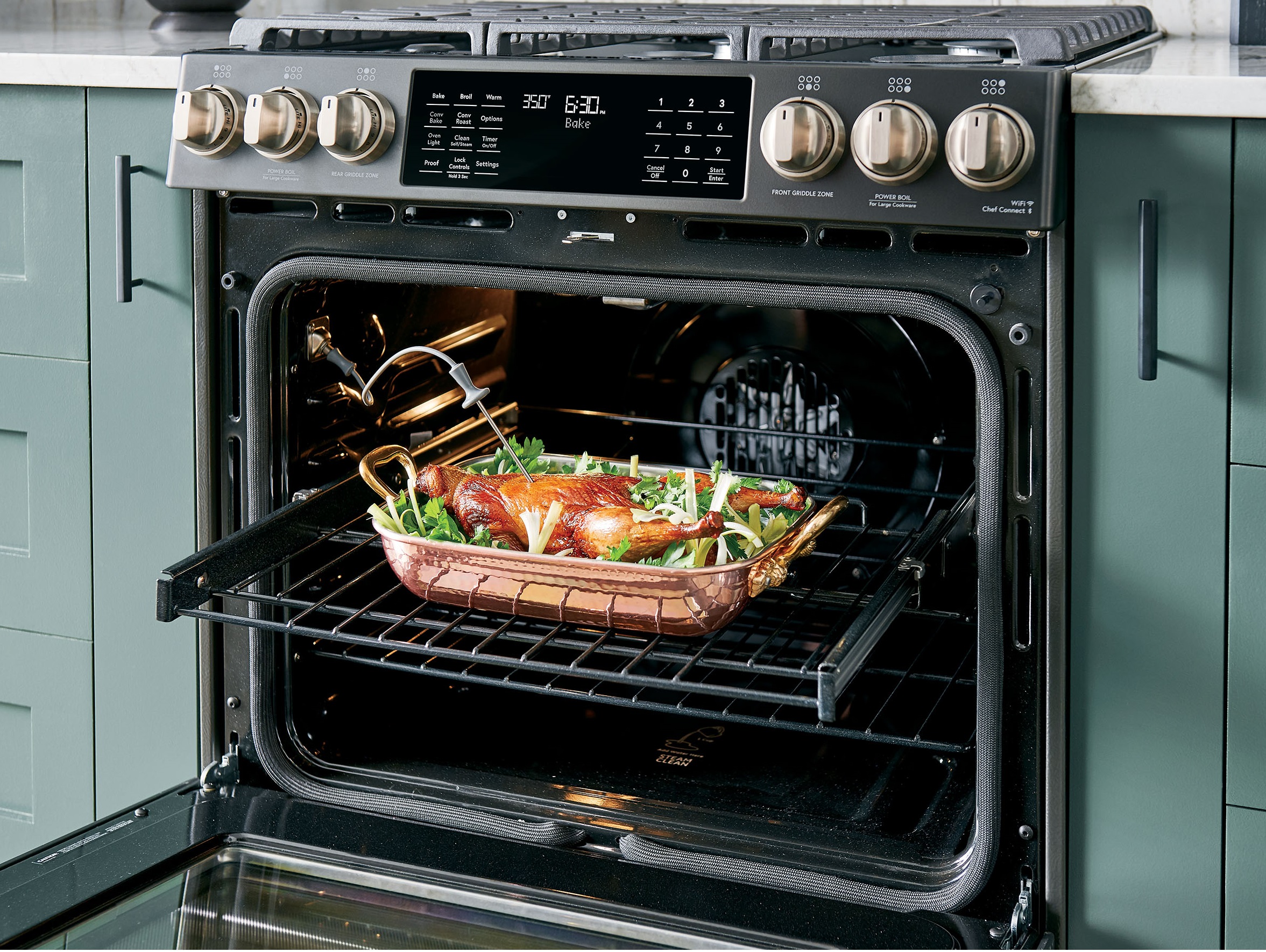 Roast baking inside Cafe CGS700P2MS1 gas range oven with meat probe