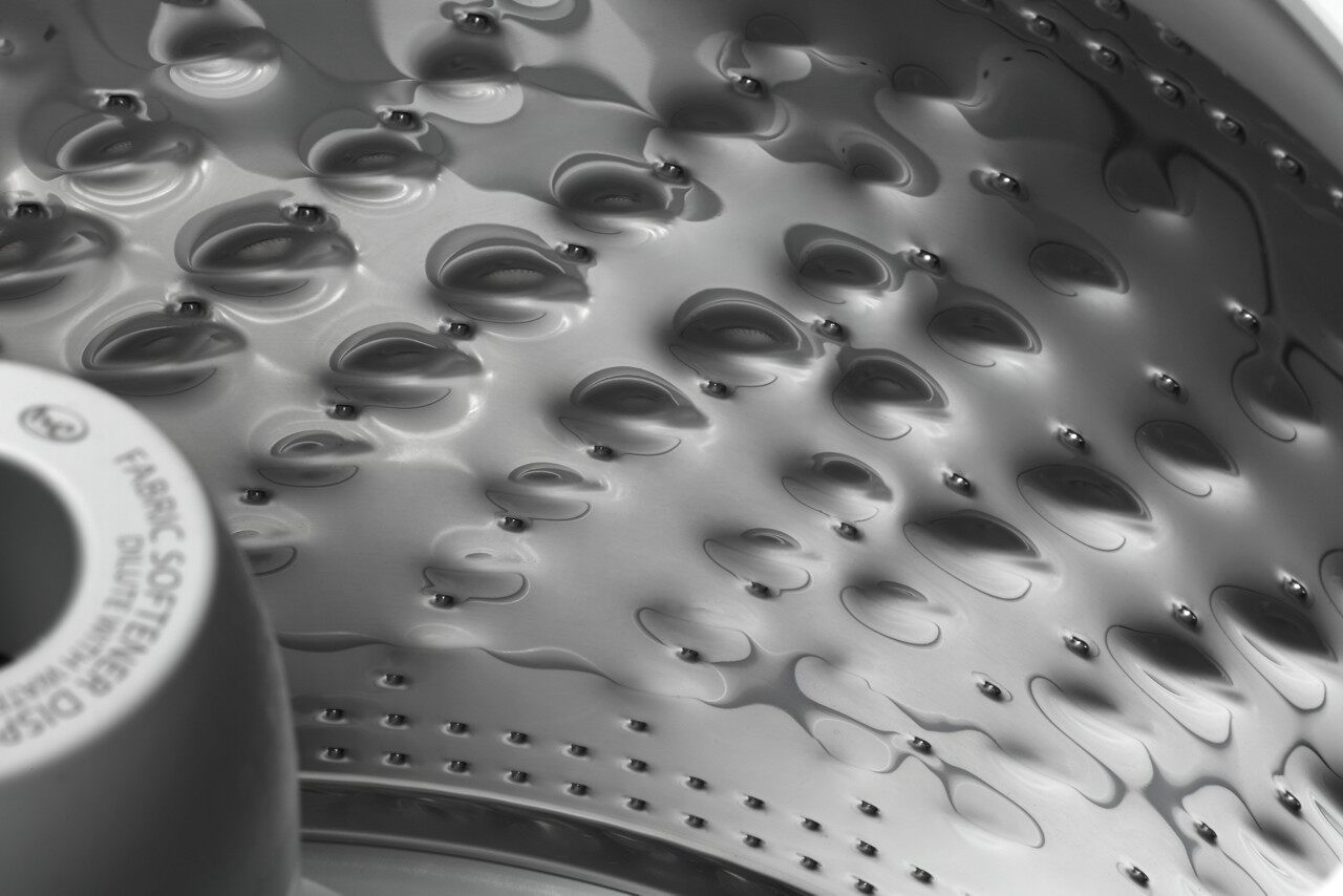 closeup of stainless steel tub on whirlpool WTW5005KW top load washer