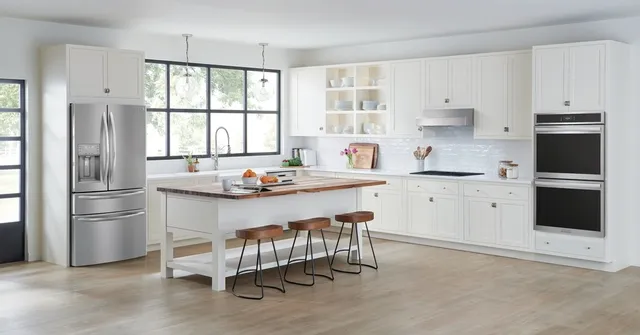 Frigidaire Gallery GCWD3067AF double wall oven shown in a modern kitchen 