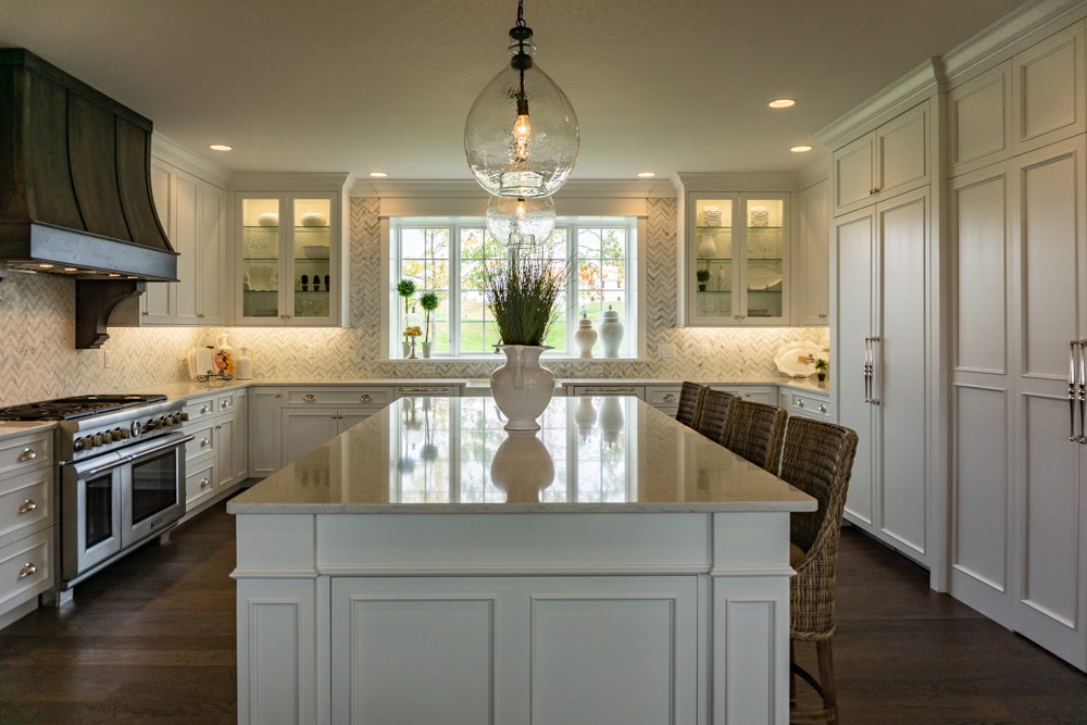 Wide shot of a kitchen renovation featuring appliances with custom fronts 