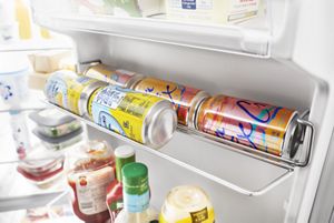 Demonstration of can caddy inside Whirlpool WRS325SDHZ side by side refrigerator 