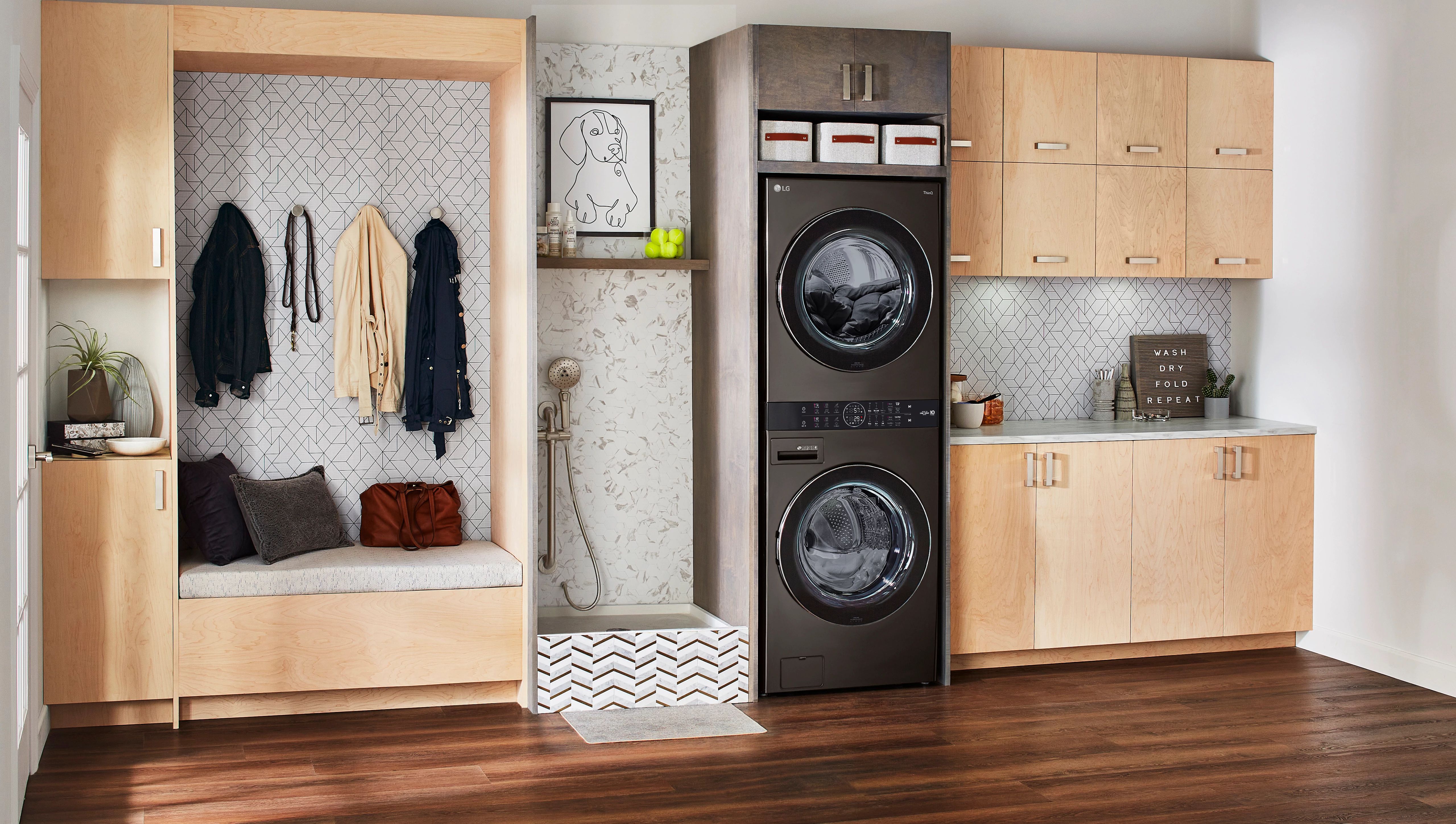 Wide shot of laundry room featuring LG WKEX200HBA WashTower