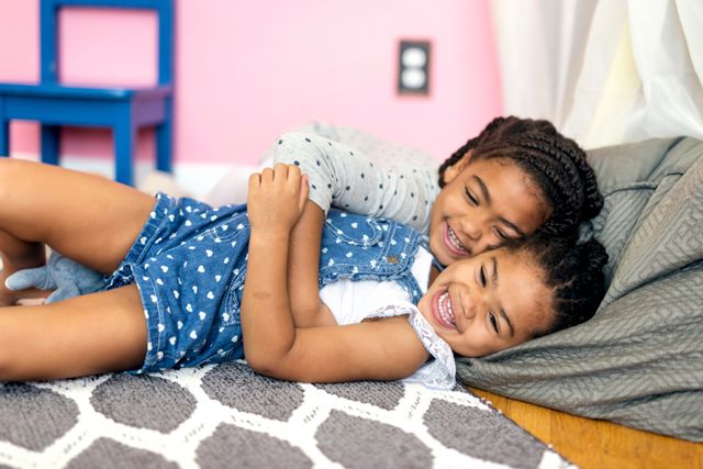 Happy Child Jumping on Bed Happy Child Jumping on Bed