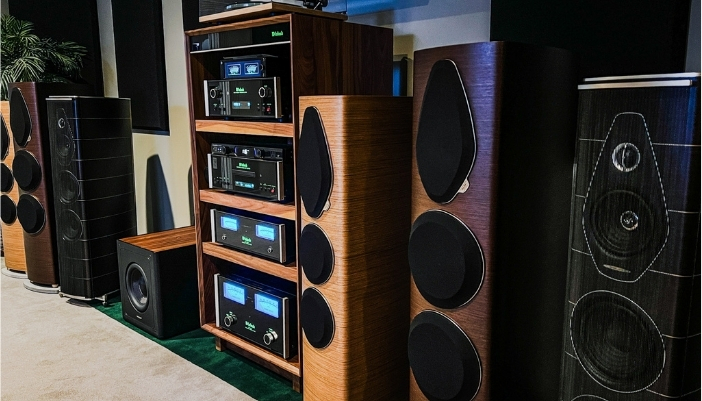 A McIntosh audio setup with dark wooden accents.