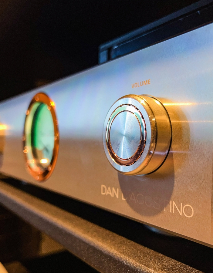 A closeup of knobs on a speaker/amplifier