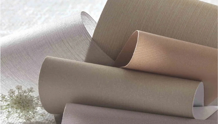 Selection of new Crestron automated shade fabric samples in various textures and finishes