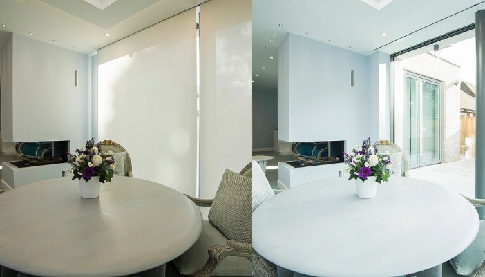Blindspace concealed shade pocket recessed into a ceiling above a window with a roller shade