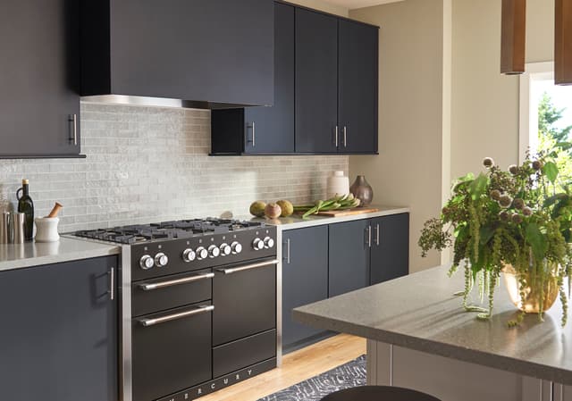 Credit: AGA Front view of a luxury kitchen with an AGA range and range hood
