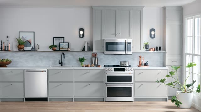 Front view of a modern kitchen with a Cafe kitchen appliance package Front view of a modern kitchen with a Cafe kitchen appliance package