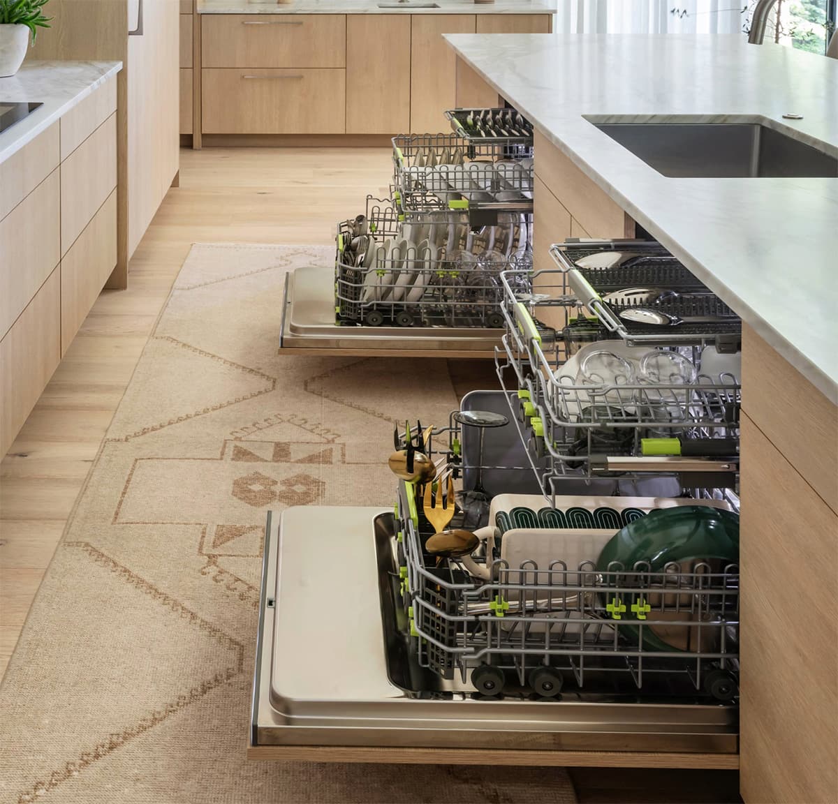 Cove Dishwasher Side Profile Side profile of an open Cove dishwasher revealing adjustable racks.