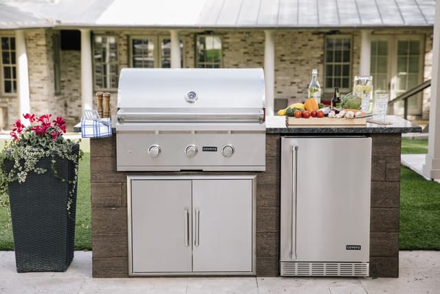 Front view of a small outdoor kitchen with Coyote appliances Front view of a small outdoor kitchen with Coyote appliances