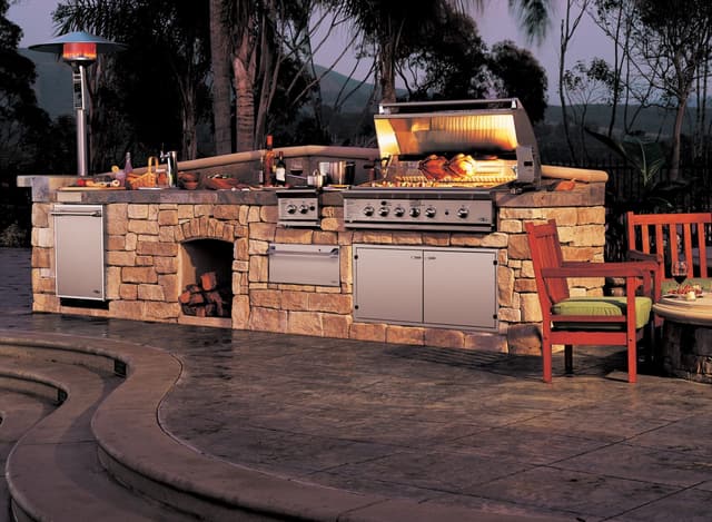 Front view of a modern outdoor kitchen with DCS outdoor appliances Front view of a modern outdoor kitchen with DCS outdoor appliances