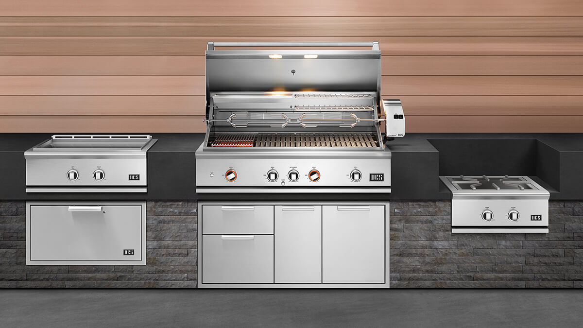 DCS professional grill in a luxury outdoor kitchen setup