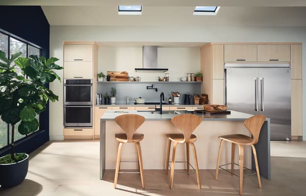 Electrolux Appliances Stainless steel appliances in a modern, minimalist kitchen