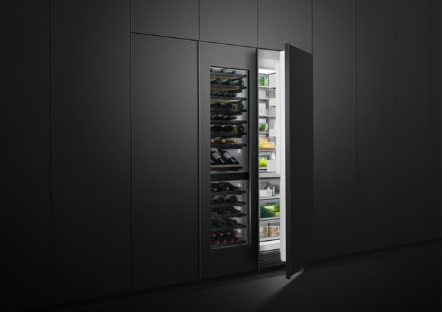 View of a fully integrated panel Fisher and Paykel refrigerator and wine cooler View of a fully integrated panel Fisher and Paykel refrigerator and wine cooler
