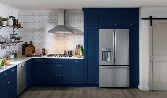 Front view of a modern kitchen with GE appliances