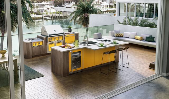 Credit: Hestan View of a high end patio with Hestan appliances including an outdoor built in mini refrigerator