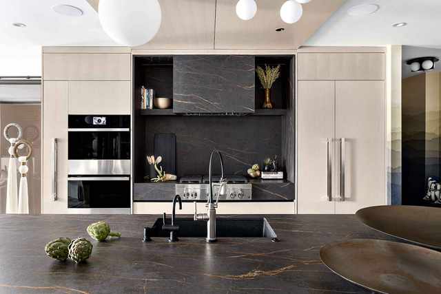 JennAir panel-ready refrigerator seamlessly integrated into kitchen cabinetry JennAir panel-ready refrigerator seamlessly integrated into kitchen cabinetry