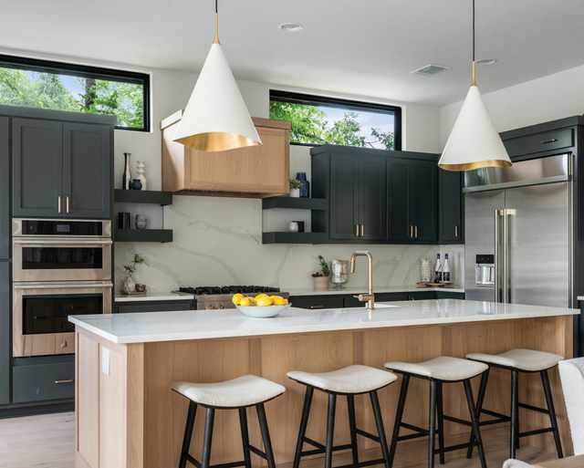 Modern kitchen featuring a JennAir RISE appliance suite Modern kitchen featuring a JennAir RISE appliance suite