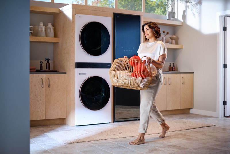Person carrying laundry basket