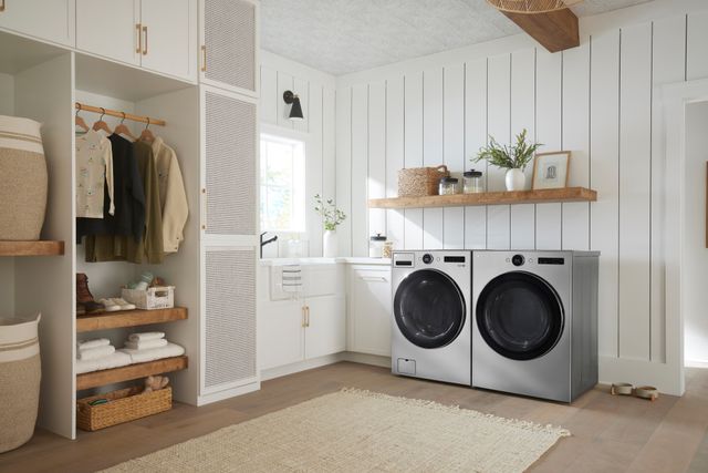 Front view of a modern laundry room with an LG washer and dryer