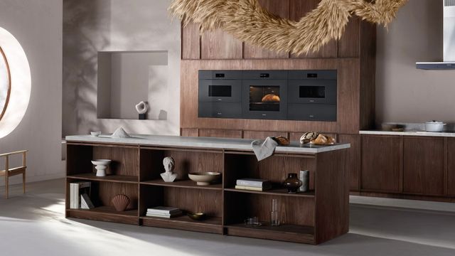 Front view of a luxury kitchen with Miele ovens