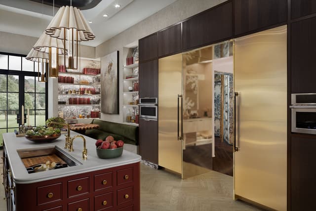 Credit: Monogram Front view of a luxury kitchen with two built in Monogram refrigerators