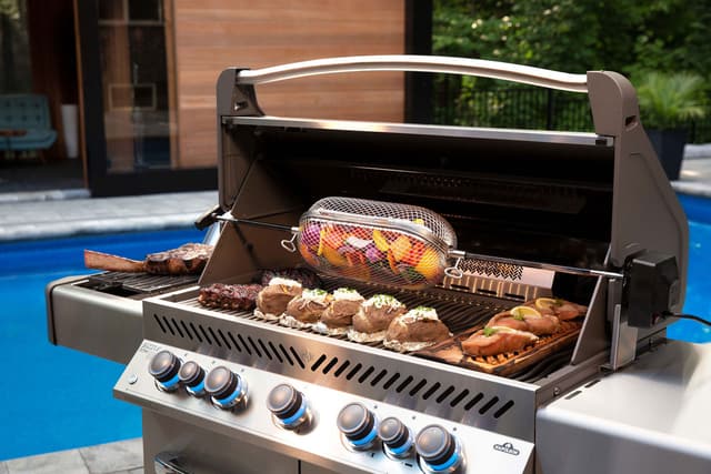 Credit: Napoleon Front view of a Napoleon freestanding grill with a rotisserie