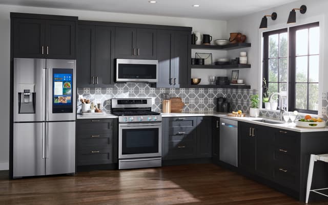 Front view of a modern kitchen with Samsung appliances