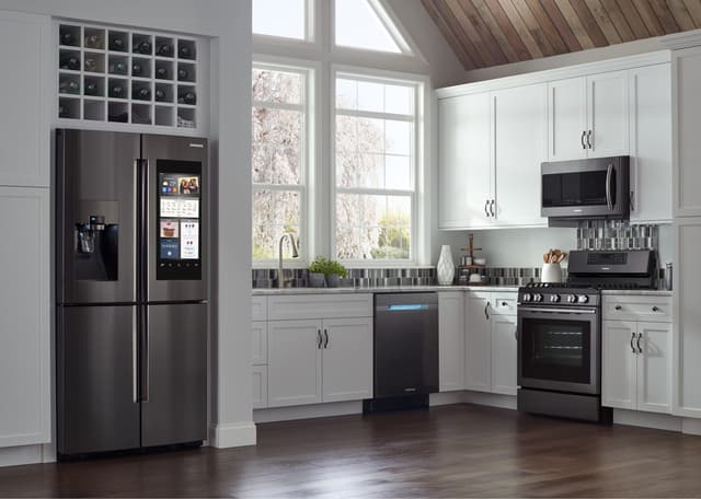 Front view of a modern kitchen with Samsung appliances