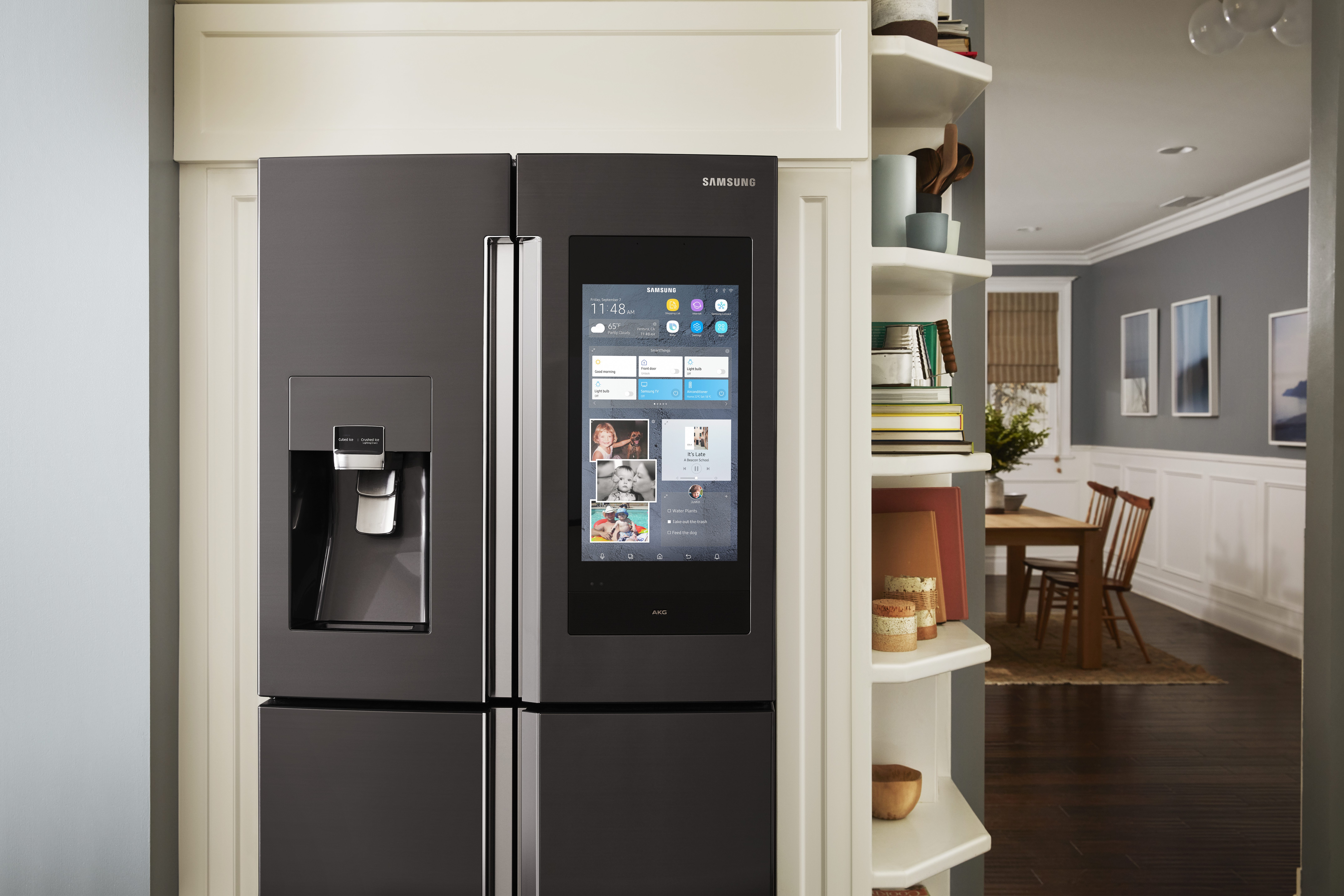 View of a casual kitchen with a Samsung smart refrigerator View of a casual kitchen with a Samsung smart refrigerator
