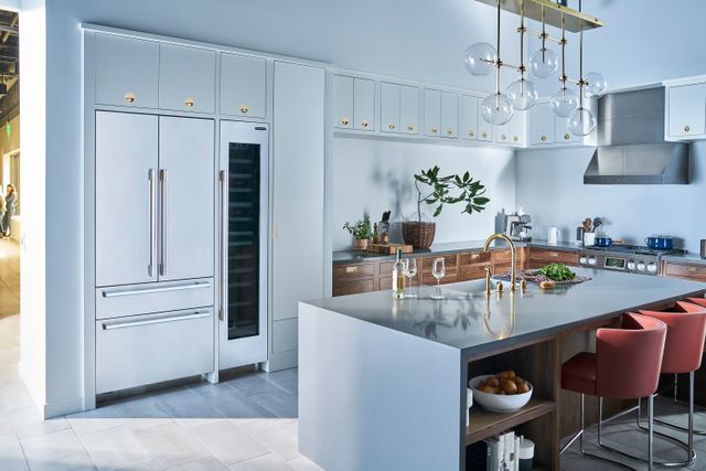 Front view of a modern kitchen with SKS stainless steel appliances