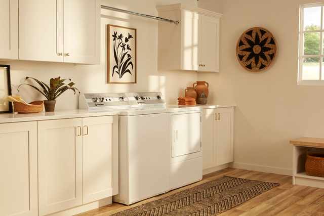 Credit: Speed Queen Front view of a modern laundry room with a Speed Queen TC5 and DC5