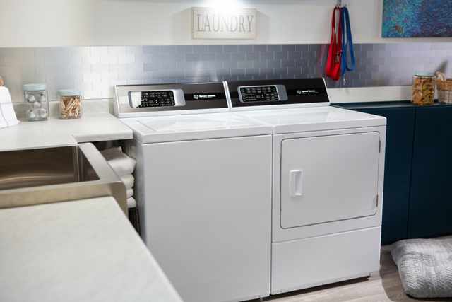 Credit: Speed Queen Front view of a Speed Queen washer and DR7 dryer in a modern laundry room