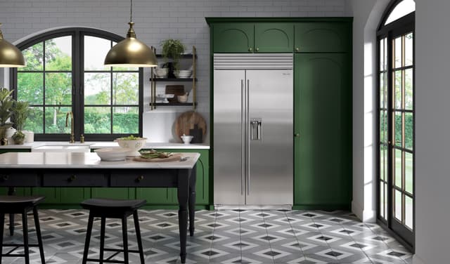 Credit: Sub-Zero Front view of a modern kitchen with a Sub-Zero built in refrigerator