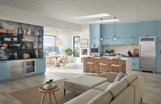 Front view of a luxury kitchen with a dedicated Sub-Zero drink fridge and beverage area Front view of a luxury kitchen with a dedicated Sub-Zero drink fridge and beverage area