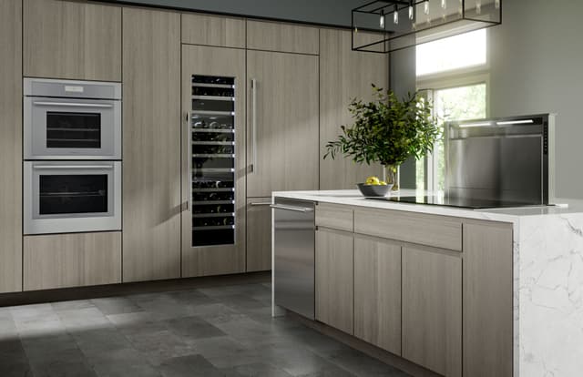 Credit: Thermador Front view of a luxury kitchen with a Thermador panel ready refrigerator and wine fridge