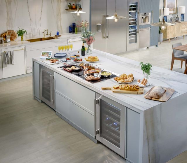 Front view of a luxury kitchen with two Thermador undercounter wine refrigerators