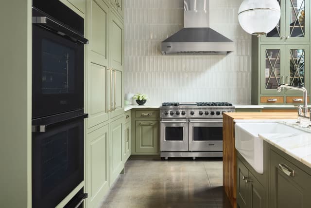 View of a modern kitchen with a Viking double wall oven and range with range hood View of a modern kitchen with a Viking double wall oven and range with range hood