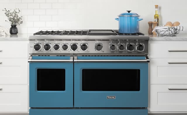 Front view of a blue Viking pro style range Front view of a blue Viking pro style range