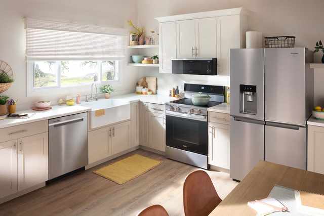 Whirlpool Refrigerator in a Modern Kitchen Setting Whirlpool Refrigerator in a Modern Kitchen Setting