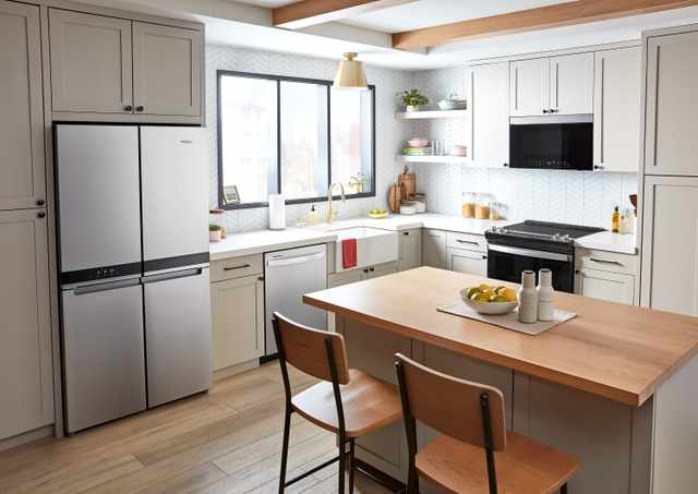 Modern kitchen featuring built-in Whirlpool appliances