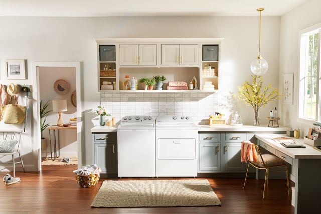 Credit: Whirlpool Front view of a modern laundry room with a Whirlpool washer and dryer
