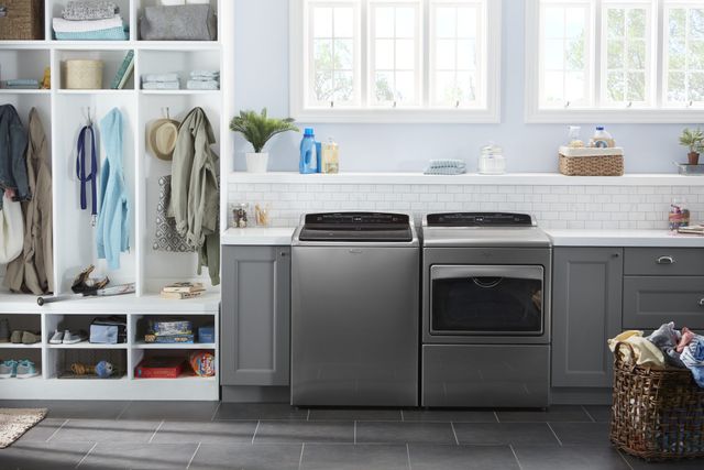 Credit: Whirlpool Front view of a modern laundry space with a Whirlpool washer and dryer