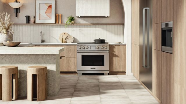 Credit: Wolf Front view of a modern kitchen with a Wolf induction range