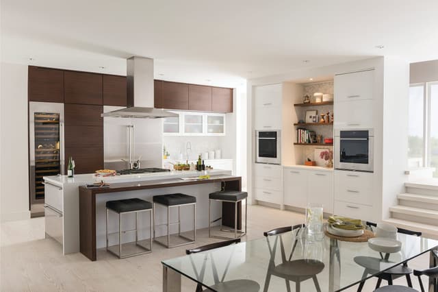 Front view of a modern minimalist kitchen with Wolf and Sub-Zero appliances