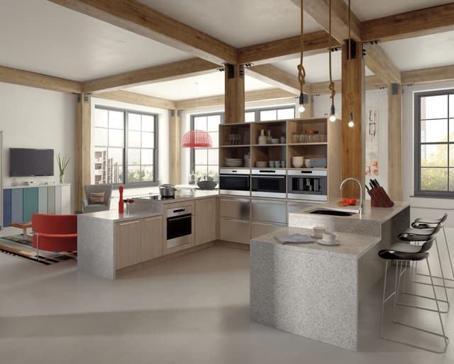 Front view of a modern kitchen with built in Wolf wall ovens